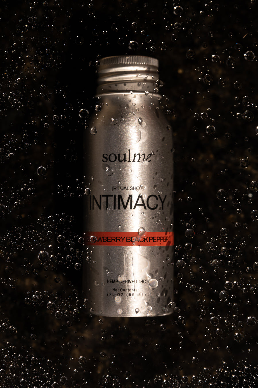 SoulMe Intimacy Ritual Shot covered in condensation on a dark background