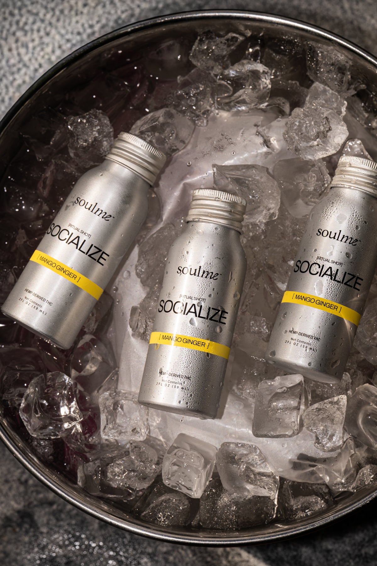 Three SoulMe Socialize Ritual Shots chilling in an ice bucket